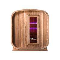 A traditional Finnish sauna made of wood, designed for outdoor use, with a door featuring a pink to purple gradient.