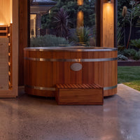 Kiva Energise cedar ice bath in a covered outdoor wellness space