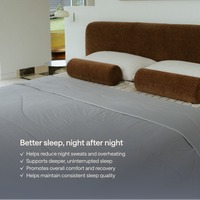 A bed with Kiva cooling blanket, shown in a modern bedroom setting.