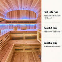 Kiva Wellness Ritual 6 Person wooden sauna interior with built-in seating, blue LED lighting, and text on the right listing dimensions for the full interior and two benches.