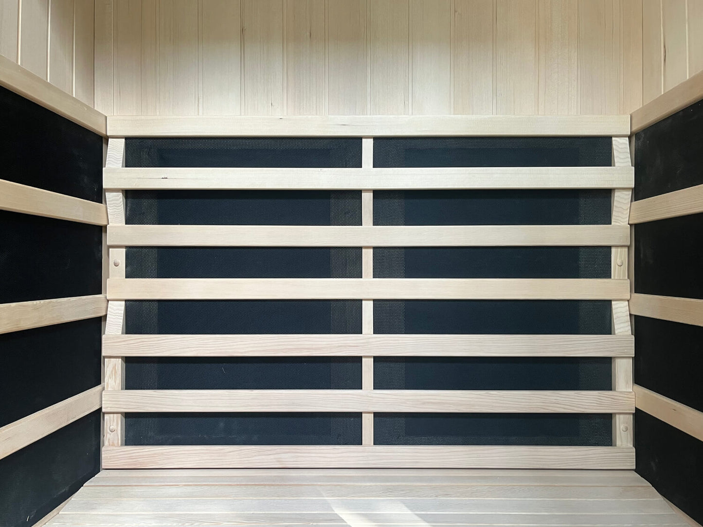 The interior of the Kiva Wellness Radiance 2 Person Full Spectrum Infrared Sauna.