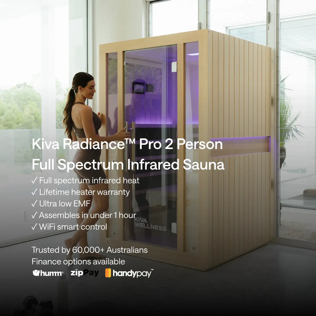 A woman stands beside a Kiva Wellness Radiance Pro 2 person sauna beside an overlay listing its features.